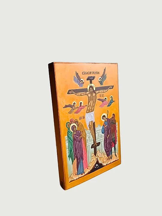 Side profile of a hand-painted Golgotha image on wood, showcasing the detailed egg tempera painting of Jesus on the Cross surrounded by Angels, Holy Mary, Saint John, and a Roman soldier. Authentic Byzantine sacred art with gold leaf accents.