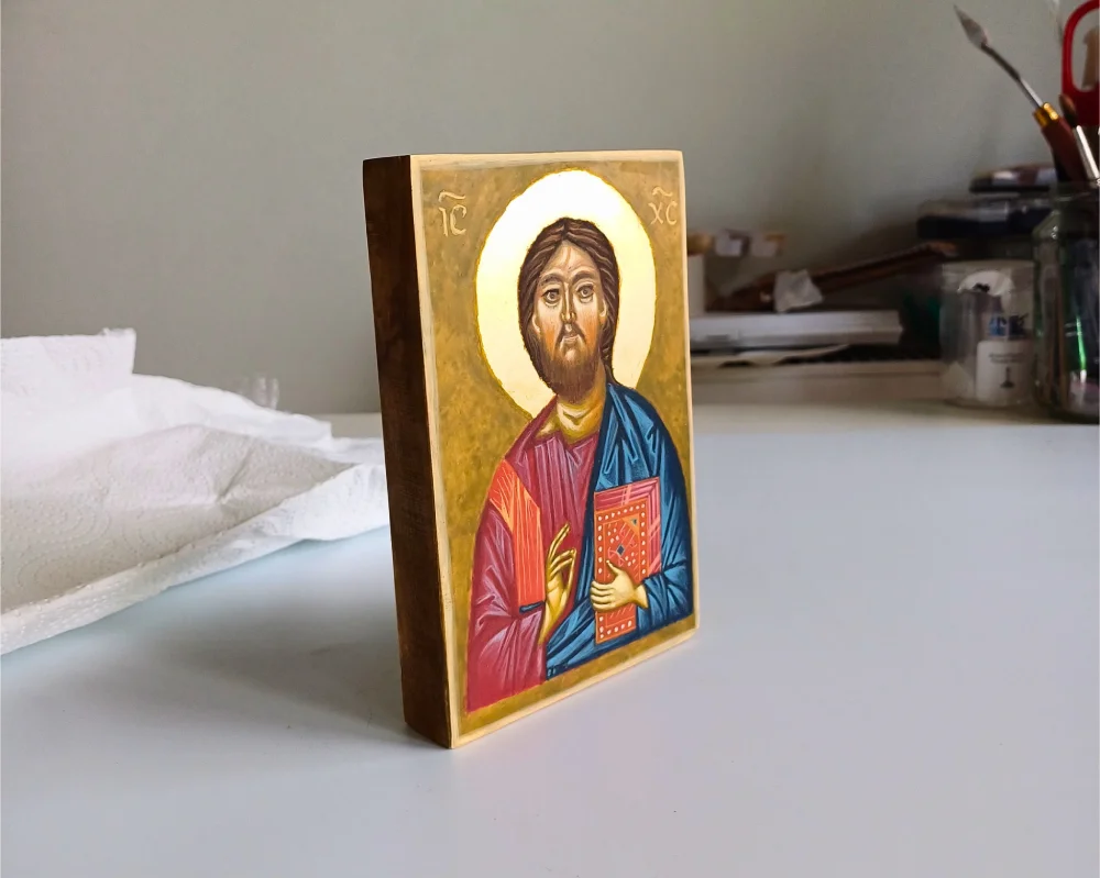 Hand-painted Christ Pantocrator icon created with egg tempera and gold leaf on linden wood.