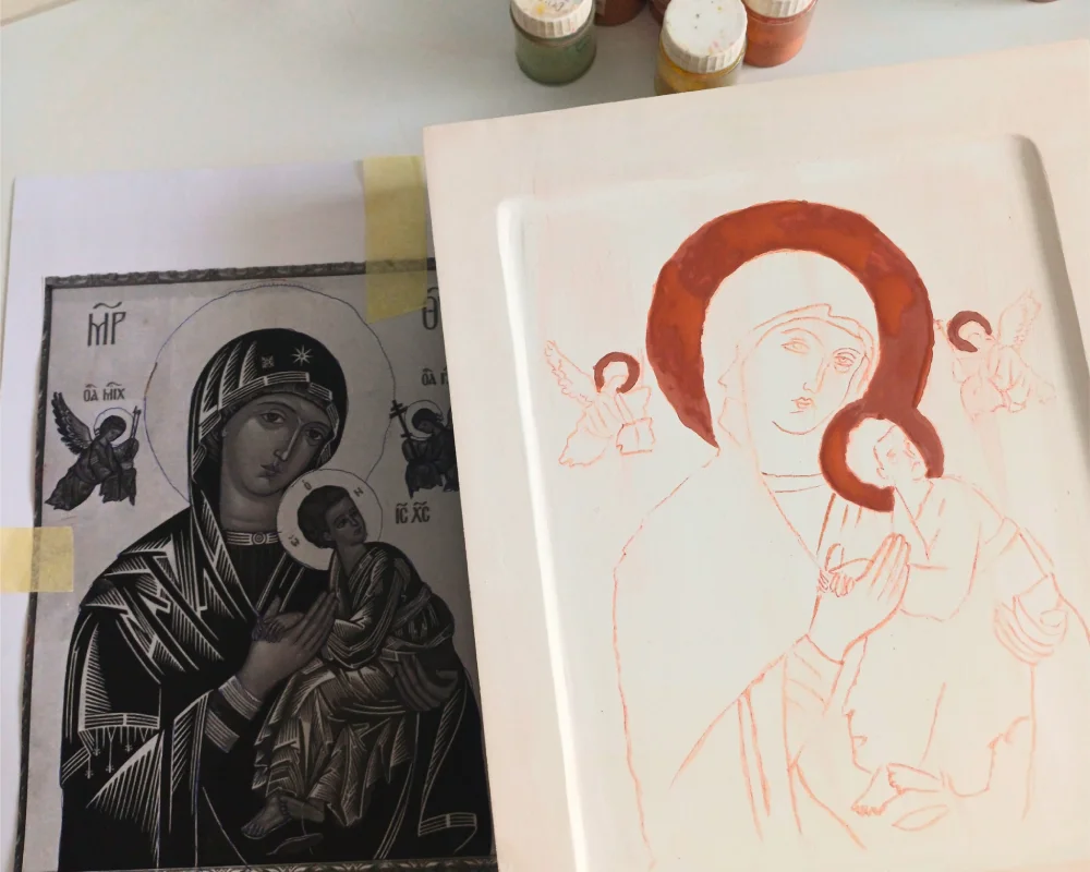 Applying red bole pulment for gilding on a hand-painted Our Lady of Perpetual Help icon at Iconoria studio.